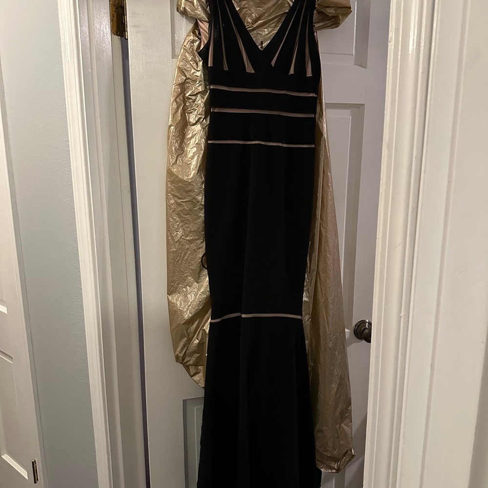 Cache black mermaid bandage gown/ dress. Worn once for prom. Size 0.